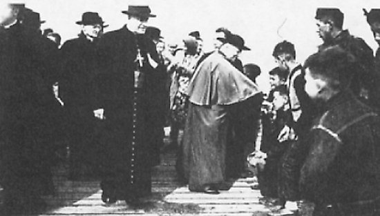 The children stand in line to greet the Cardinal.