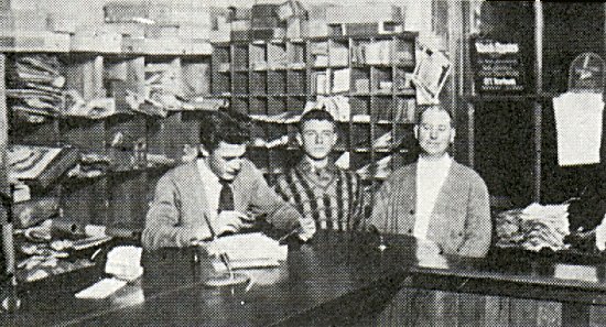 Frank Michie, Alex Afanasieff, and Mr. Forbes inside the Post Office