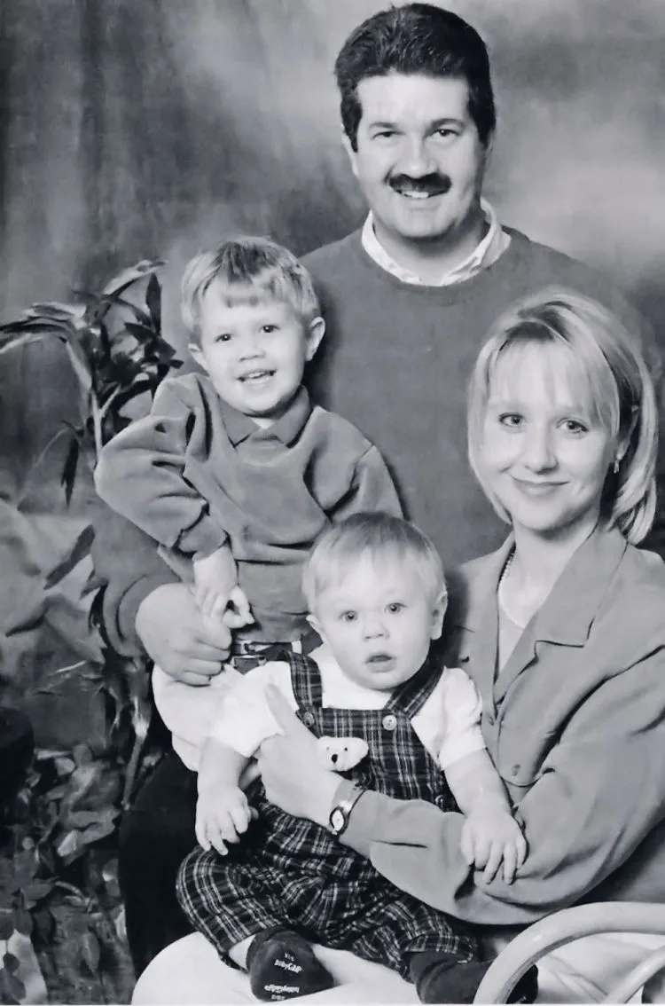 Calvin (holding Chase) and Bridget (holding Connor).