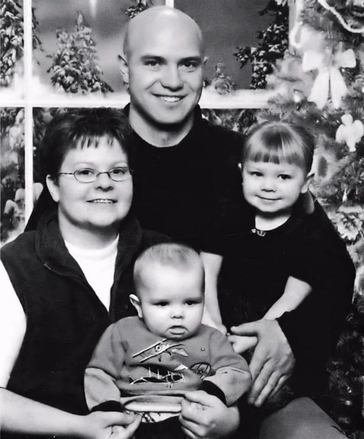 Clint, holding Emma, Niki, holding Ethan.