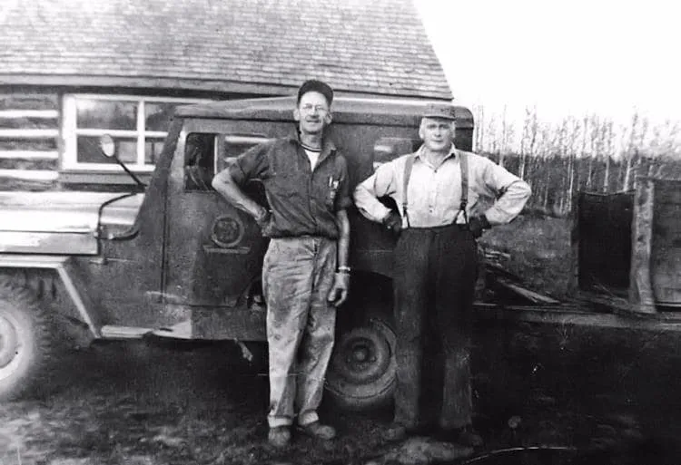 Kurt Bengston and Ted in front of the old tree nursery office and the nursery jeep. 1950.