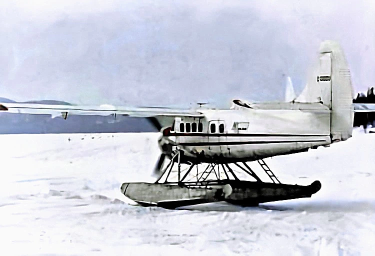 Plane on ice with pontoons.