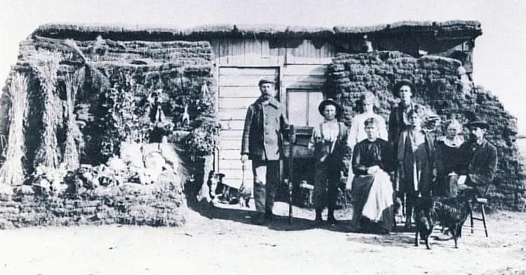 Sod and lumber home, built by Menno Moyer.